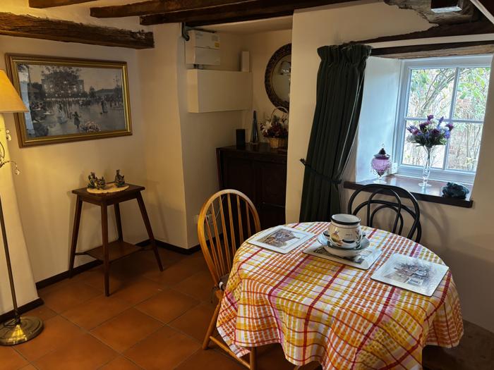 Dining table by the cottage window