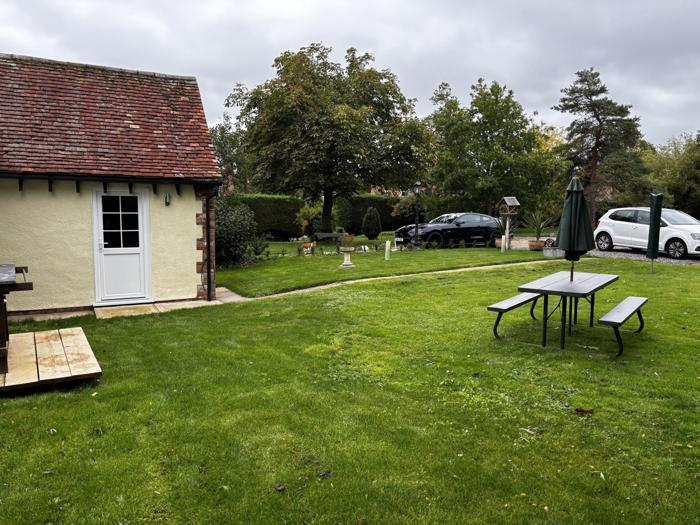 Large lawn with picnic table